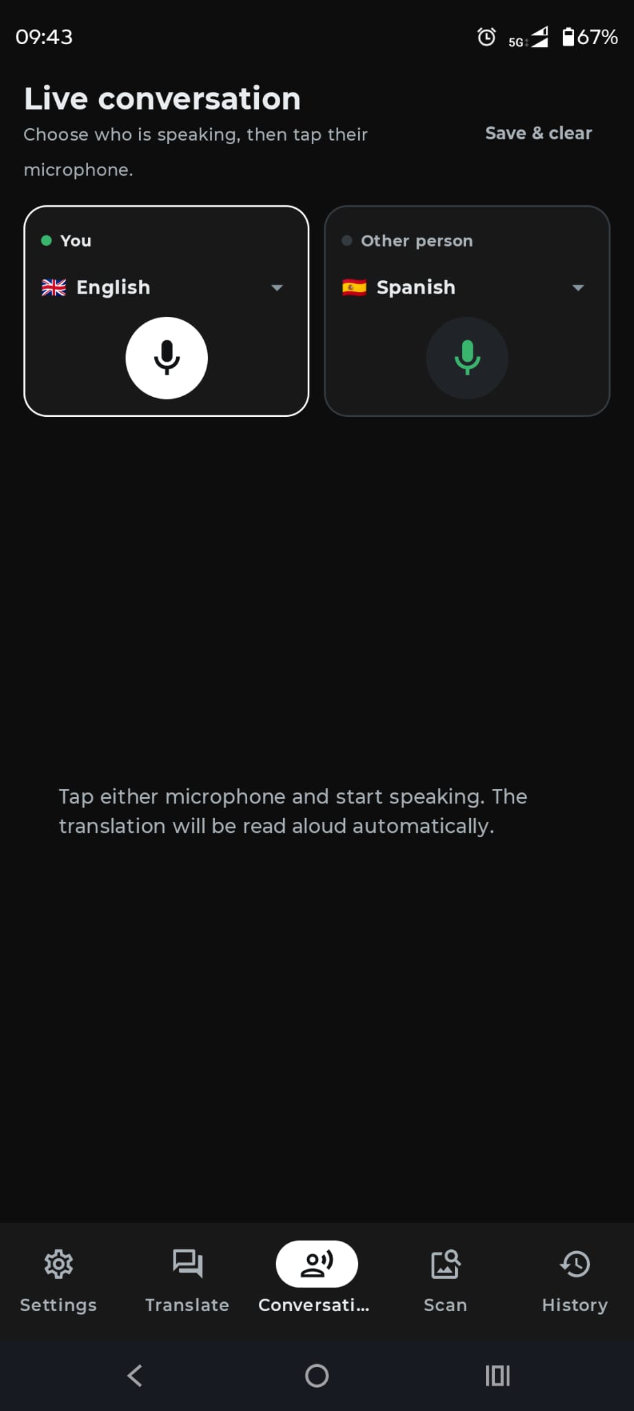 Live conversation screen with English and Spanish microphones